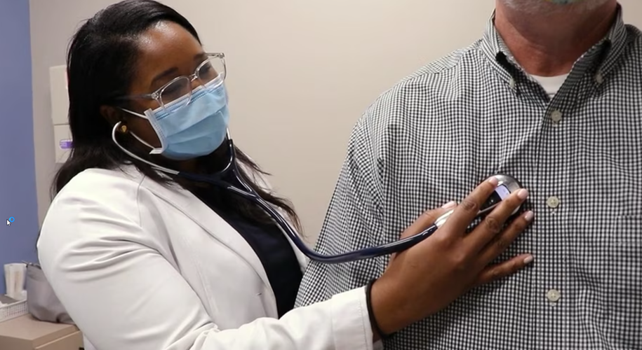 Provider checking someone's heart